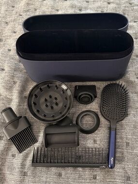 Dyson navy and black hair tool set with paddle brush and attachments
